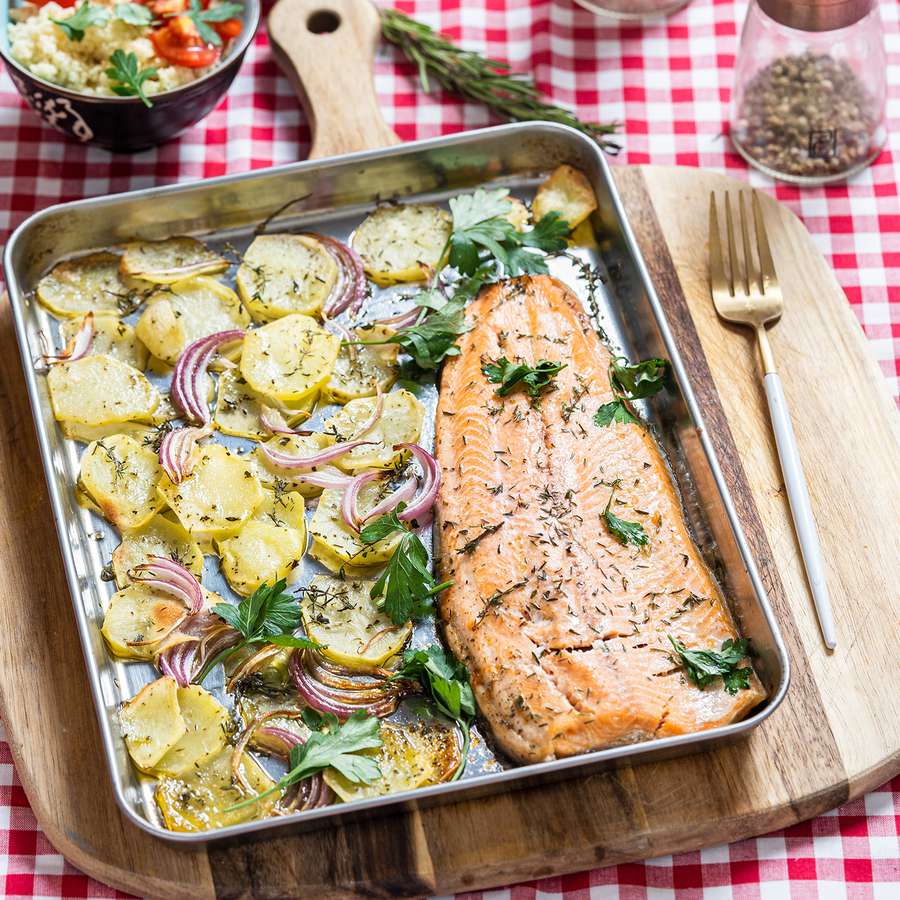 Baked Salmon filet with potatoes with cous cous side